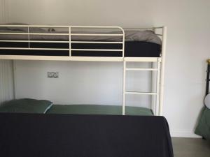 BeaurepaireにあるChez Mimiの部屋に二段ベッドがいくつかある