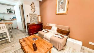 Ένα ή περισσότερα κρεβάτια σε δωμάτιο στο Maison des îles