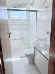 Ένα μπάνιο στο Flat Mucuri - Praia centro