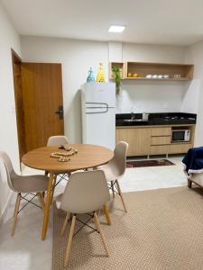 Η κουζίνα ή μικρή κουζίνα στο Flat Mucuri - Praia centro