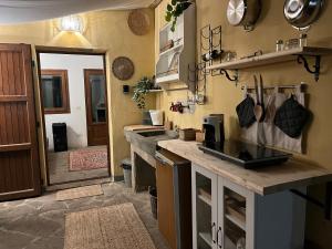 Η κουζίνα ή μικρή κουζίνα στο SassiNeri Country House