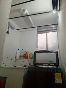 Kuchyň nebo kuchyňský kout v ubytování Habitación confortable cama doble Ibagué + 2 fotografie