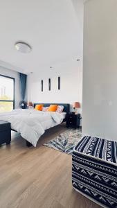 Postel nebo postele na pokoji v ubytování Orchid residency