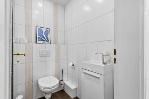 Koupelna v ubytování Modernes City Apartment mit Aussicht und WLAN + 11 fotografií