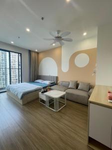 Ένα ή περισσότερα κρεβάτια σε δωμάτιο στο GM Apartment Vinhomes Smart City