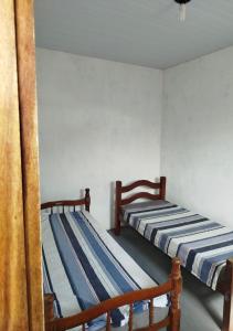 Postel nebo postele na pokoji v ubytování Casa Brisa do Mar