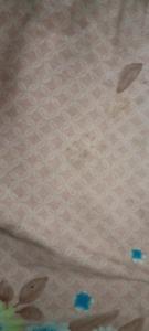 a piece of paper with flowers on it at Hotel Radhe in New Delhi