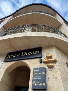 ajust a dream sign on the side of a building at Just a Dream in Troyan