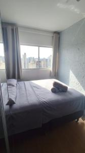 Letto o letti in una camera di Apê com vista incrível - Centro Altre 21 foto