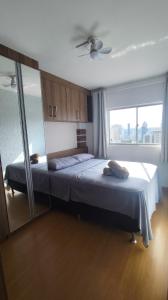 Letto o letti in una camera di Apê com vista incrível - Centro