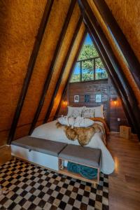 Postel nebo postele na pokoji v ubytování Chalé Vista do Vale Urubici SC