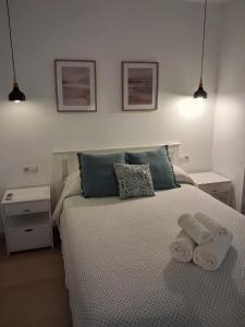 Postel nebo postele na pokoji v ubytování Apartamento La Bahia