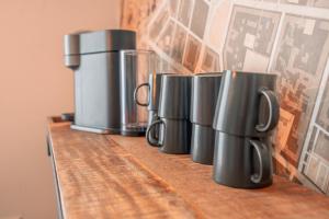 Příslušenství pro přípravu čaje a kávy v ubytování NEW! Exceptional design loft in a TOP location + 10 fotografií