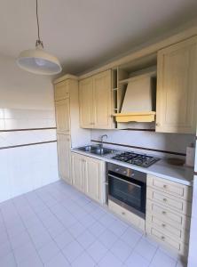 Köök või kööginurk majutusasutuses BePlace La Nuvola