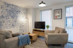 Μια τηλεόραση ή/και κέντρο ψυχαγωγίας στο Modern 2 Bed - Central Manchester - Free Parking