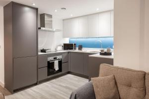 Η κουζίνα ή μικρή κουζίνα στο Modern 2 Bed - Central Manchester - Free Parking