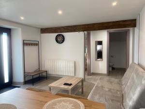 Χώρος καθιστικού στο Maison Gîtes de l'étang caché