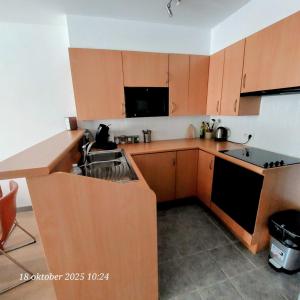 Kuchyň nebo kuchyňský kout v ubytování Maison de la mer