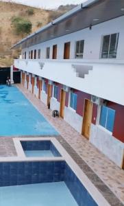 Πισίνα στο ή κοντά στο Hotel El Rio