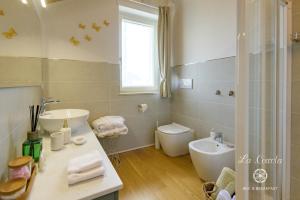 Koupelna v ubytování B&B La Coccola