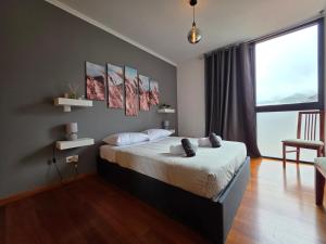 Katil atau katil-katil dalam bilik di Ocean View Machico