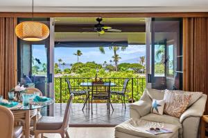 a living room with a view of the ocean at Maui Eldorado Condo K207 in Kaanapali