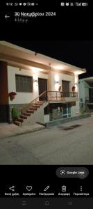 a house with a staircase in front of it at VILLA MAKRI 2 in Mákri