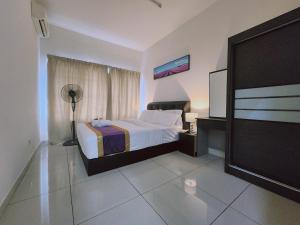 Una cama o camas en una habitación de Savanna Residence Southville City 64 fotos más