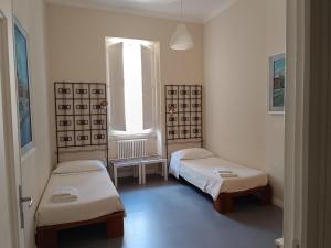 En eller flere senge i et værelse på daniel's house