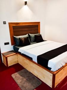 Postel nebo postele na pokoji v ubytování Evergreen Resort Ella + 11 fotografií