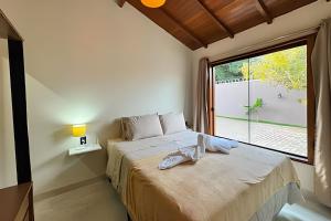 Katil atau katil-katil dalam bilik di Flat Fernandes no Centro de Bonito