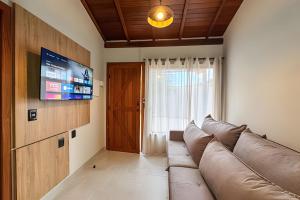 Televisyen dan/atau pusat hiburan di Flat Fernandes no Centro de Bonito
