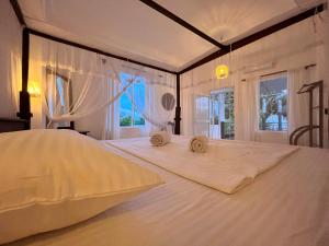 Una cama o camas en una habitación de Star Eyes 63 fotos más