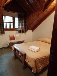 a bedroom with a large bed in a room at Vila Bela in Tigre