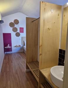 a bathroom with a sink and a toilet in a room at Pink Yellow Porto Apart in Porto