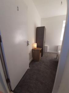 Postel nebo postele na pokoji v ubytování Carlisle October