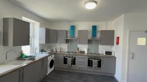 Kuchyň nebo kuchyňský kout v ubytování Carlisle October