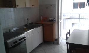 Η κουζίνα ή μικρή κουζίνα στο Umbria 83 Apartment