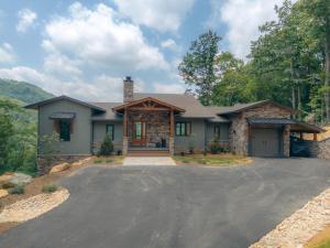 a house with a driveway in front of it at Sky's the Limit at Blue Ridge Mountain Club in Boone