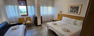 Postel nebo postele na pokoji v ubytování Hotel Riviera Belsoggiorno + 34 fotografií