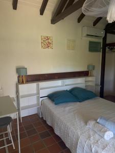 Ένα ή περισσότερα κρεβάτια σε δωμάτιο στο Bungalow Nature Plage Surf Helleux