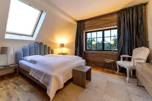 a bedroom with a large bed and a window at BORECZNA in Michałkowa +79 photos
