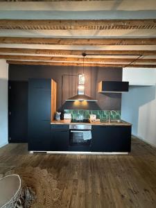 Кухня или мини-кухня в Sān home’s
