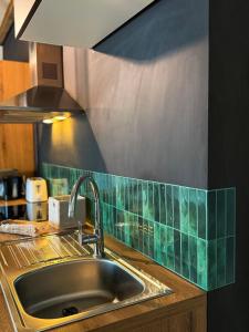 Кухня или мини-кухня в Sān home’s
