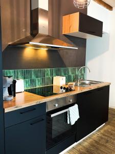 Кухня или мини-кухня в Sān home’s
