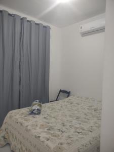 Postel nebo postele na pokoji v ubytování Casa com 2 Quartos e Churrasqueira, No Alto da Rasa