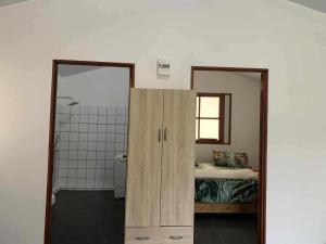 Ένα ή περισσότερα κρεβάτια σε δωμάτιο στο Atau Fare CK