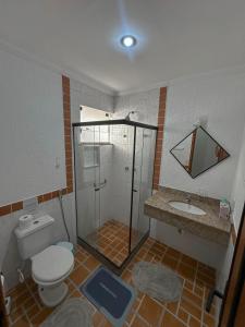 Ванная комната в Varandas ao Mar apartamento 216 Praia Grande