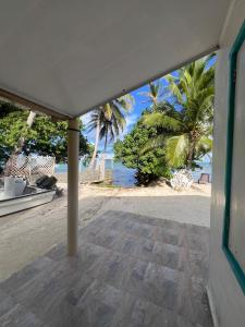 a view of a beach with palm trees and the ocean at Bella Marcela in Buenavista +26 photos