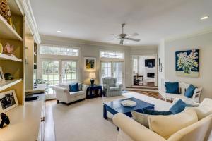 a living room with a couch and a table at GE317: 317 Glen Eagle in Kiawah Island